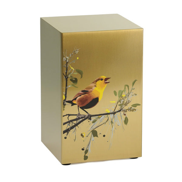 Gold-toned stainless steel cremation urn featuring a vibrant yellow bird perched on a branch, part of the Life Canvas Birds Bronze Collection.