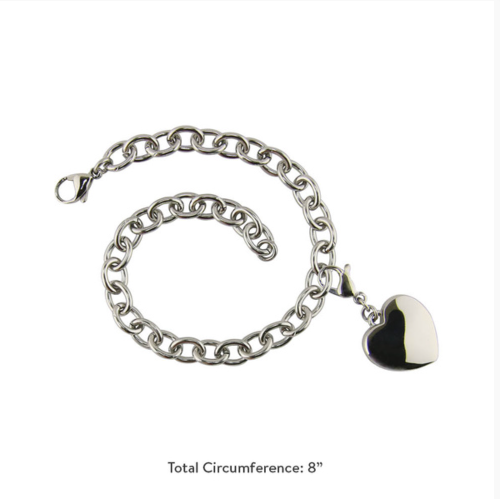 The Charm Bracelet with Heart Charm, available at Magnolia Cremations, is a polished stainless steel bracelet featuring a petite heart-shaped charm. Designed to hold a small portion of ashes, this timeless piece offers a meaningful way to keep a loved one close. The bracelet has a total circumference of 8 inches and secures with a lobster clasp for comfortable wear. Engraving is available for personalization.