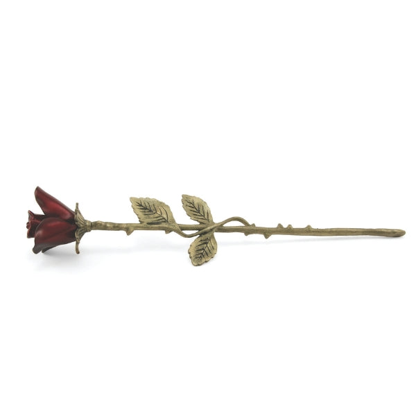 The Crimson Rose Keepsake, available at Magnolia Cremations, is shown in its gold and deep crimson red finish. Crafted from brass, this elegant memorial rose features detailed leaves, a textured stem, and rich red petals, designed for a timeless home display. It holds a nominal amount of ashes, serving as a lasting tribute to a loved one.