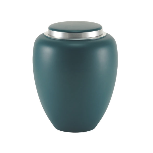 A matte teal-sapphire blue memorial urn with a silver lid. The urn has a smooth, modern design with a gently curved shape. Engraving is available.