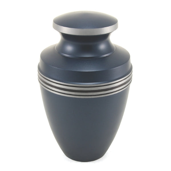 A matte blue urn with a smooth, tapered shape, featuring silver-tone accent bands around the upper portion and a matching silver rim on the lid. Engraving is available for personalization.
