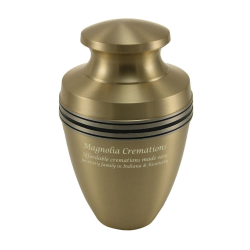 A metallic gold urn with black accent bands near the top. It has a smooth, polished finish and a rounded, domed lid. The urn features engraved text on the front, and engraving is available for personalization.