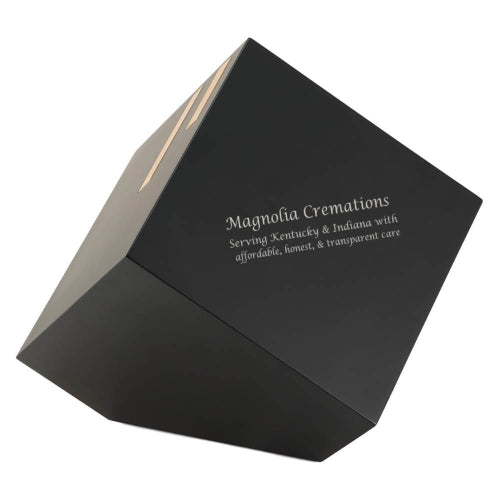 A contemporary cremation urn with a sleek matte black finish, accented by natural bamboo inlays. The geometric cube design offers a modern, artistic tribute. Engraving is shown on the urn and available for personalization, allowing for a meaningful custom memorial.