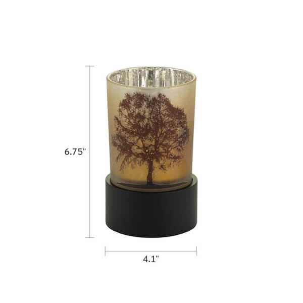 Keepsake urn that doubles as a tealight candle holder, featuring a frosted glass design with a detailed tree silhouette and a black circular base. Dimensions are shown: 6.75 inches tall and 4.1 inches wide.