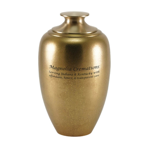 A modern cremation urn from the Luna Collection, featuring a gracefully curved design with a textured golden finish. The urn's warm golden tones and smooth, tapered shape create an elegant and timeless memorial. Engraving is shown and available for personalization, allowing for a unique tribute to a loved one.
