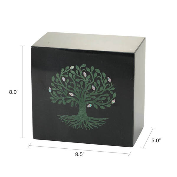 Black marble cremation urn with a decorative green tree inlay featuring swirling branches, roots, and iridescent leaf-shaped accents; dimensions are shown as 8.0 inches high, 8.5 inches wide, and 5.0 inches deep.