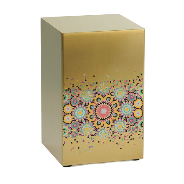 The Mosaic in Bronze Memorial Urn from Magnolia Cremations features a stunning, contemporary design with intricate mosaic patterns and vibrant confetti-like details. Crafted from brushed stainless steel with a warm bronze finish, this full-size cremation urn combines artistic expression with timeless elegance. A meaningful tribute that adds a personalized, heartfelt touch to any memorial space.