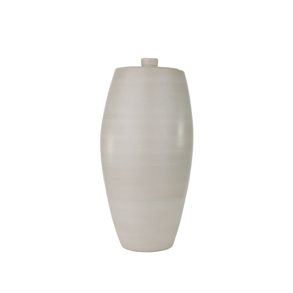 A full-size ceramic urn in beach beige from the exclusive Nouveau Pure collection for Magnolia Cremations by Stoneware & Co. The urn has a sleek, tapered silhouette with a smooth, unadorned surface that highlights its timeless elegance. Its soft, neutral tone evokes a sense of tranquility, making it a dignified and contemporary memorial piece. A matching ceramic lid sits atop the urn, seamlessly blending with its refined design.