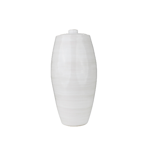 A full-size ceramic urn in cloud white from the exclusive Nouveau Pure collection for Magnolia Cremations by Stoneware & Co. The urn features a smooth, tapered design with a subtle, handcrafted texture. Its minimalist aesthetic and soft white glaze create a serene and timeless tribute. The urn is set against a transparent background, showcasing its elegant form and craftsmanship.