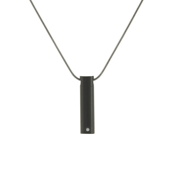 The Onyx Cylinder with Cubic Zirconia Memorial Necklace, available at Magnolia Cremations, is a sleek black stainless steel pendant with a minimalist cylindrical design. A single cubic zirconia accent adds a subtle touch of elegance. This modern piece discreetly holds a small portion of ashes, offering a meaningful tribute. The pendant includes a matching chain and offers an engraving option for personalization.