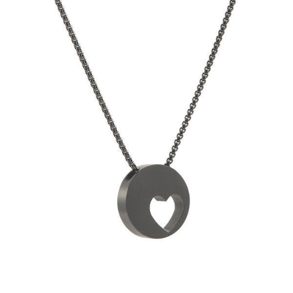 The Onyx Eternity Heart Memorial Necklace, available at Magnolia Cremations, is a sleek black stainless steel pendant featuring a heart-shaped cutout. With its modern, minimalist design, this piece discreetly holds a small portion of ashes, offering a meaningful way to honor a loved one. The pendant is paired with a matching 21-inch chain and includes an engraving option for personalization.