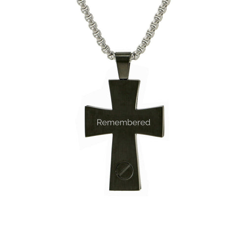 The Onyx Textured Cross and Chain, available at Magnolia Cremations, is a stainless steel pendant with a bold cross design and a discreet compartment for holding a small portion of ashes. The back of the pendant is engraved with a personalized message. It comes with a matching chain for a meaningful and elegant tribute.