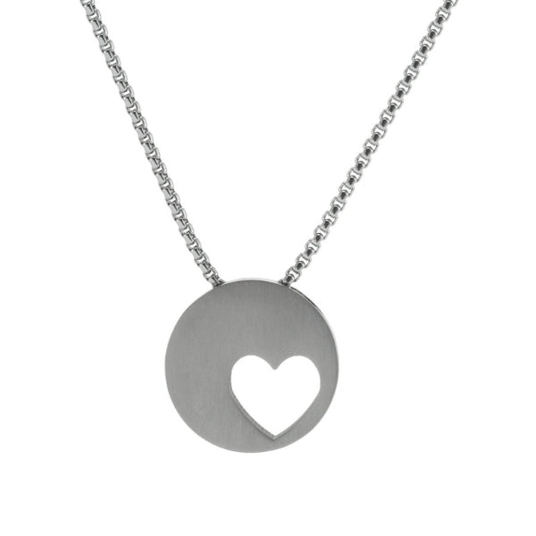 The Pewter Eternity Heart Memorial Necklace, available at Magnolia Cremations, is a stainless steel pendant featuring a modern circular design with an off-centered heart cutout. This elegant keepsake discreetly holds a nominal amount of ashes, providing a meaningful way to honor a loved one. The image showcases the optional engraving feature, allowing for personalization. The necklace includes a matching 21-inch chain for a complete and timeless tribute.