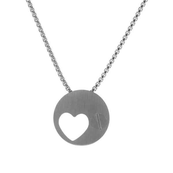 The Pewter Eternity Heart Memorial Necklace, available at Magnolia Cremations, features a sleek stainless steel pendant with an off-centered heart cutout, symbolizing eternal love and remembrance. The discreet screw-top closure, visible in the image, reveals a small compartment designed to hold a nominal amount of ashes. This memorial keepsake comes with a 21-inch matching chain, making it a timeless and meaningful tribute. Engraving is available for personalization.