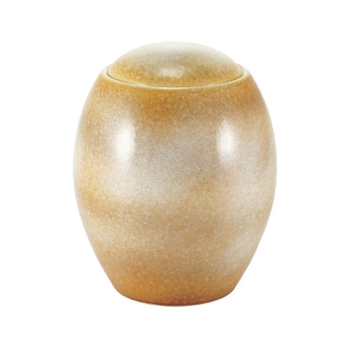 The Serene Reflections Sandy White Memorial Urn, available at Magnolia Cremations, showcases a gracefully rounded ceramic design with a unique beige and brown glaze. Its smooth, organic finish ensures that each urn is one-of-a-kind, offering a peaceful and elegant tribute.