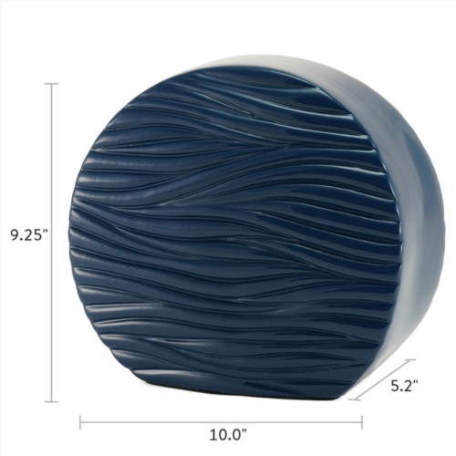 The Windham Soft Waves Glossy Blue Memorial Urn, available at Magnolia Cremations, is a contemporary ceramic urn with a circular shape and a deep, glossy blue finish. The surface features an elegant wave-like texture, symbolizing movement and tranquility. The urn measures 9.25 inches in height, 10 inches in width, and 5.2 inches in depth.