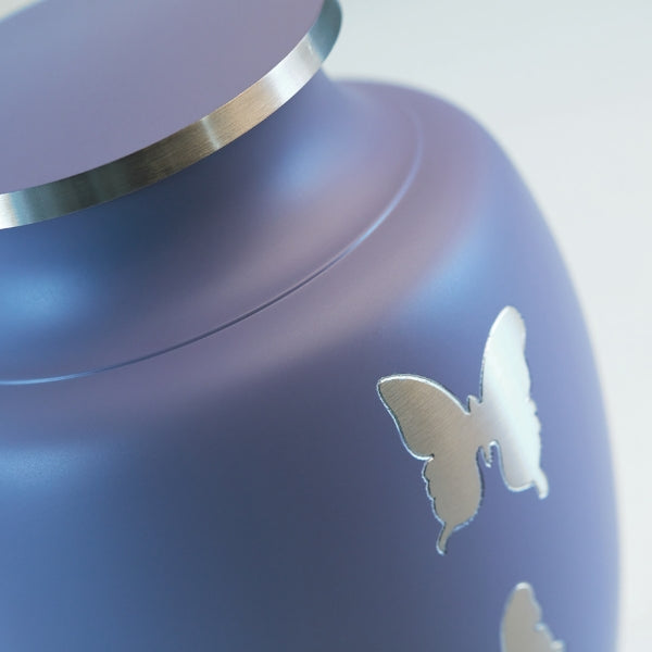 Aria Butterfly cremation urn in lavender with pewter butterfly accents.