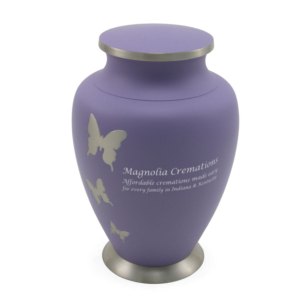 Lavender and pewter urn with decorative butterflies.