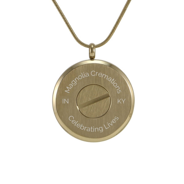 Round cremation pendant with hinged glass front. This bronze pendant allows you to keep a photo and a small amount of ashes close to your heart.  A meaningful and discreet way to remember a loved one.