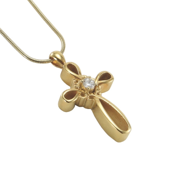 The Bronze Infinity Cross Memorial Necklace, available at Magnolia Cremations, is a gold-tone stainless steel pendant featuring an elegant infinity cross design with open loops and a central cubic zirconia. Designed to hold a small portion of ashes, this piece serves as a meaningful tribute to a loved one. The pendant comes with a matching 19-inch chain.