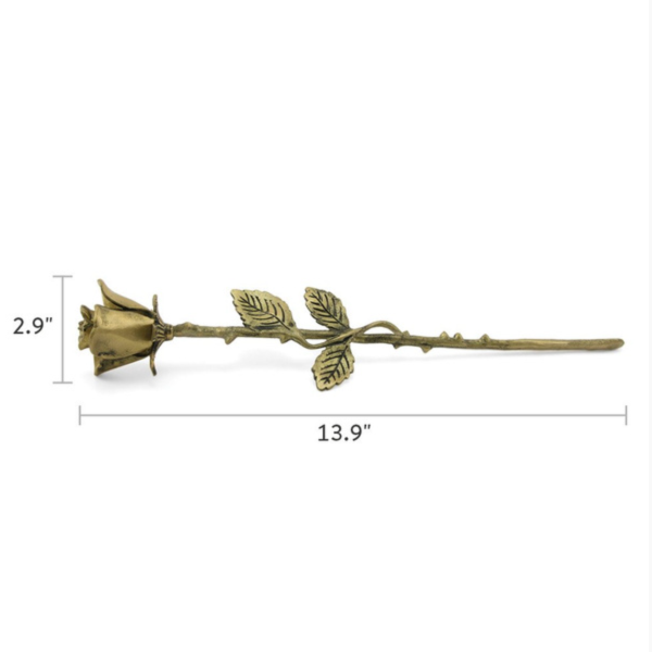 The Bronze Rose Keepsake, available at Magnolia Cremations, is shown with its detailed dimensions. This brass memorial piece is 13.9 inches long and 2.9 inches wide at the rose bloom, crafted to resemble a real rose with intricate leaves, a textured stem, and delicate petals. Designed to hold a nominal amount of ashes, it serves as a lasting tribute to a loved one.