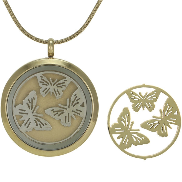 The Bronze Round Butterflies Pendant Necklace, available at Magnolia Cremations, is a gold-tone stainless steel pendant with delicate silver-tone butterfly inserts. Designed to hold ashes and customizable with engraving, it beautifully honors a loved one's memory.