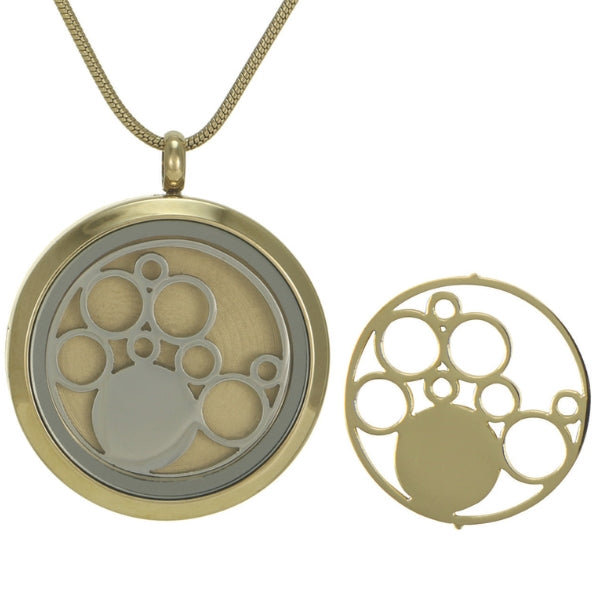 The Bronze Round Circles Pendant Necklace, available at Magnolia Cremations, is a gold-tone stainless steel pendant featuring elegant silver-tone circular details. It securely holds ashes and can be engraved for a personal tribute.