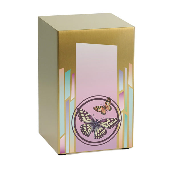 Life Canvas Butterflies Bronze Full-Size Cremation Urn. A rectangular stainless-steel urn with a brushed bronze finish, featuring a soft pink and lavender gradient design with two detailed butterflies enclosed in a circular accent. Vertical pastel geometric patterns add an elegant touch. Designed for home display and can be personalized with engraving. 200 cubic inch capacity.