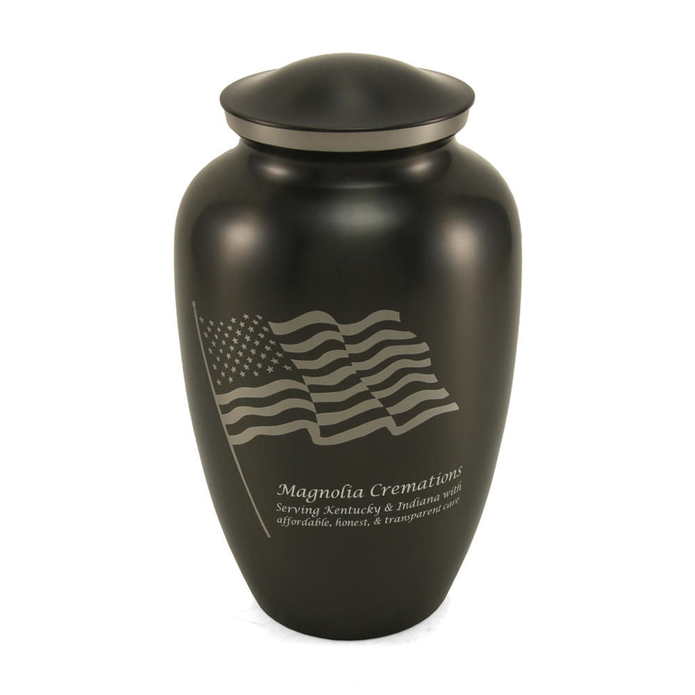 Classic vase-shaped urn in slate gray with an American flag.