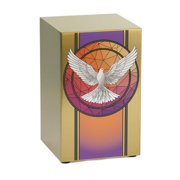 A gold-toned stainless steel urn with a vibrant dove design, featuring a white dove with outstretched wings set against a geometric, stained glass-inspired background in shades of orange, purple, and red. The contemporary memorial urn is part of the Life Canvas Series and can be personalized with engraving.