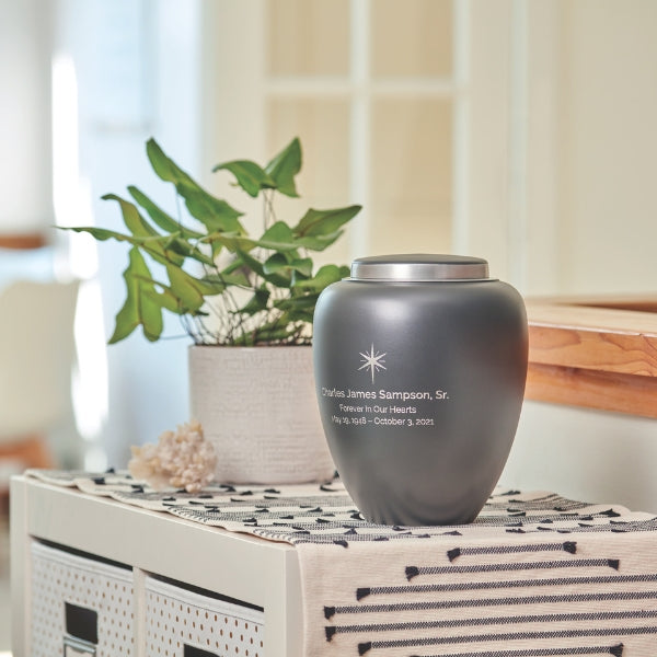 Modern urn with a rounded rectangular shape and a subtle gray finish. Emerson Granite by Terrybear.