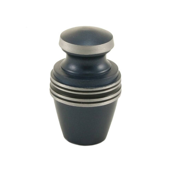 The Grecian Blue Keepsake Urn, available at Magnolia Cremations, is a small aluminum urn with a deep matte blue finish and silver-tone bands encircling its body. The sleek, minimalist design offers a dignified and timeless tribute. Designed to hold a small portion of ashes, this keepsake allows family members to each keep a cherished remembrance of their loved one.