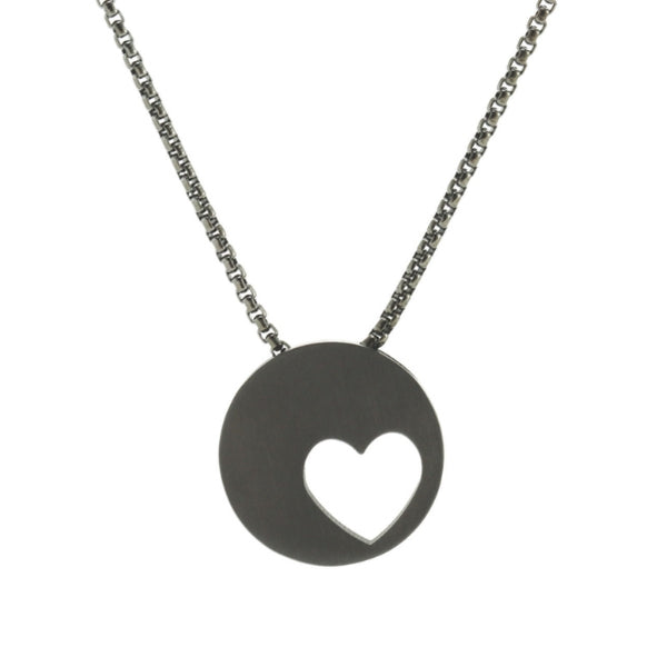 Onyx heart pendant on a chain, for holding ashes.