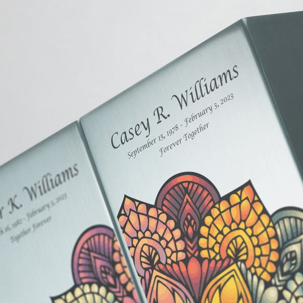 Close-up of the Mandala in Pewter Companion Urns by Magnolia Cremations, showcasing a brushed pewter finish with a vibrant mandala design. The elegant engravings personalize each urn, creating a meaningful tribute for loved ones. This modern cremation urn set symbolizes unity, remembrance, and the beauty of a shared legacy.