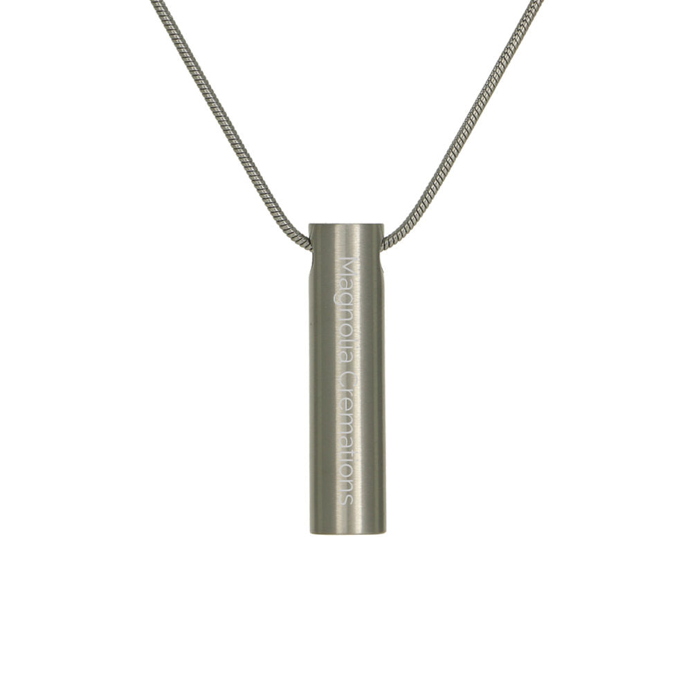 Engraved pewter cylinder pendant with a matching chain.