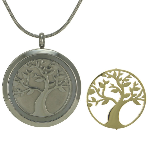 The Pewter Round Tree Pendant Necklace, available at Magnolia Cremations, is shown with both its pewter and 14k-plated bronze tree inserts, symbolizing strength, growth, and remembrance. This stainless steel cremation pendant holds a small portion of ashes, offering a meaningful way to honor a loved one. The design includes engraving options for personalization and comes with a matching 19-inch chain.
