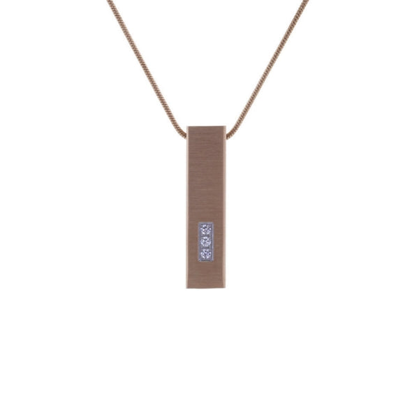 The Rose Pillar w/ Cubic Zirconia Memorial Necklace, available at Magnolia Cremations, features a sleek rose gold-tone finish with three sparkling cubic zirconia accents. This stainless steel pendant is designed to hold a nominal amount of ashes, serving as a beautiful tribute to a loved one. The modern pillar shape symbolizes strength and remembrance, offering a timeless and elegant way to keep memories close. This necklace includes a matching 19-inch chain with a lobster claw clasp for secure wear.