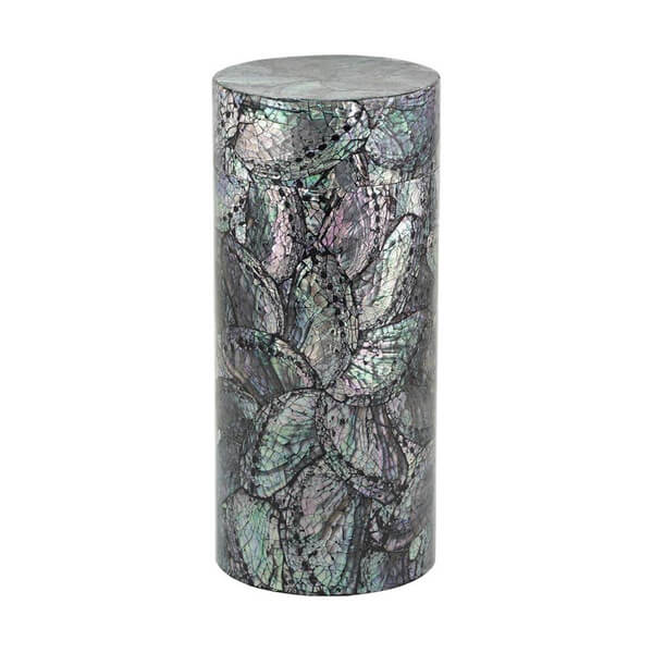 Cylindrical scattering urn with a glossy surface, decorated with an iridescent mosaic of abalone shell pieces arranged in a floral pattern featuring overlapping petal shapes in shades of green, purple, and black.