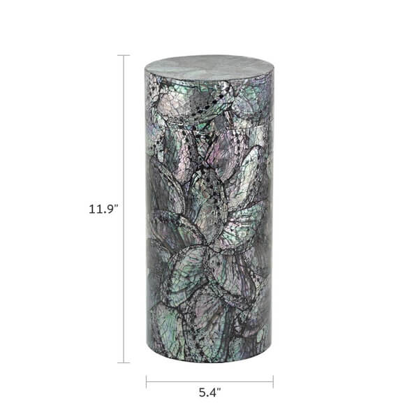 Cylindrical scattering urn with an iridescent abalone shell floral mosaic design, measuring 11.9 inches tall and 5.4 inches in diameter. The surface features a glossy finish with overlapping petal patterns in shades of green, purple, and black.