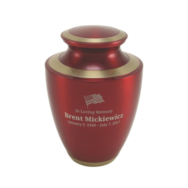 The Trinity Crimson Memorial Urn, available at Magnolia Cremations, featuring a deep red high-gloss finish with gold accents. The urn is engraved with a personalized tribute, demonstrating the customization options available.