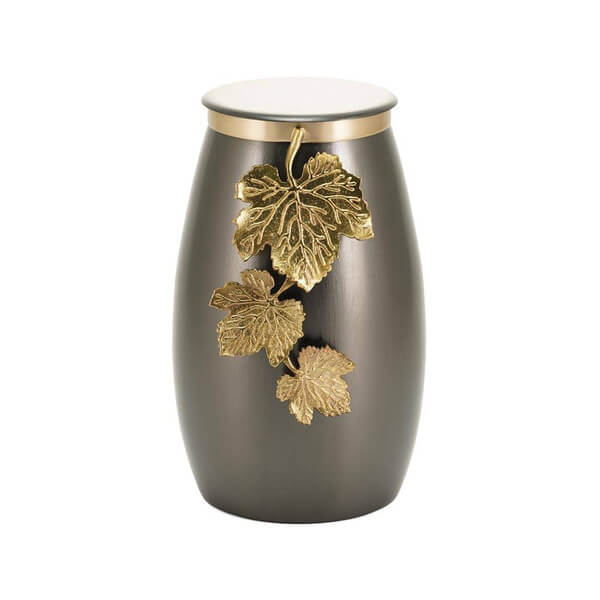 Slate gray cremation urn with a smooth, curved shape, featuring a decorative gold vine with three detailed leaves on the front and a matching gold trim on the lid.