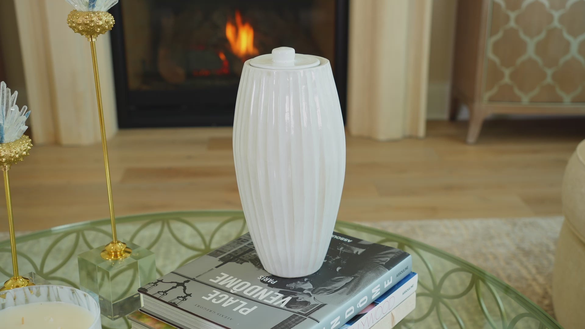 Tall urn with a textured, grooved surface and a clean white finish. Nouveau Groove Cloud.