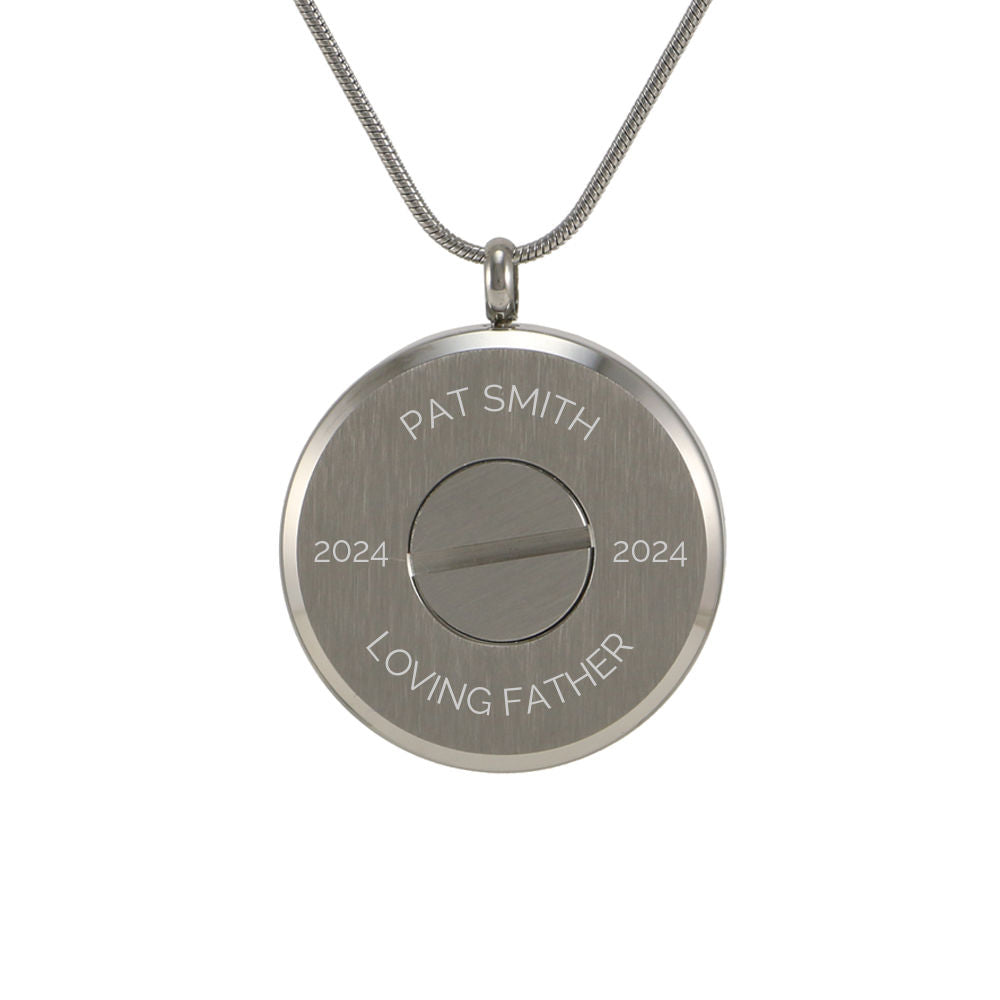 Round pewter pendant featuring birds in flight, on a chain.